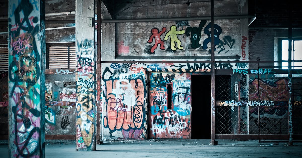 Colorful graffiti art on the walls of an abandoned building, showcasing urban street art culture.