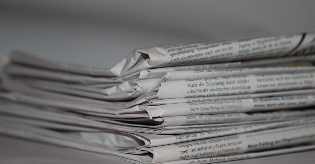 A close-up image of folded newspapers, perfect for news or journalism themes.