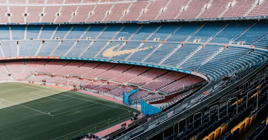 A serene view of Camp Nou Stadium seating, showcasing its vastness and iconic design in Barcelona, Spain.