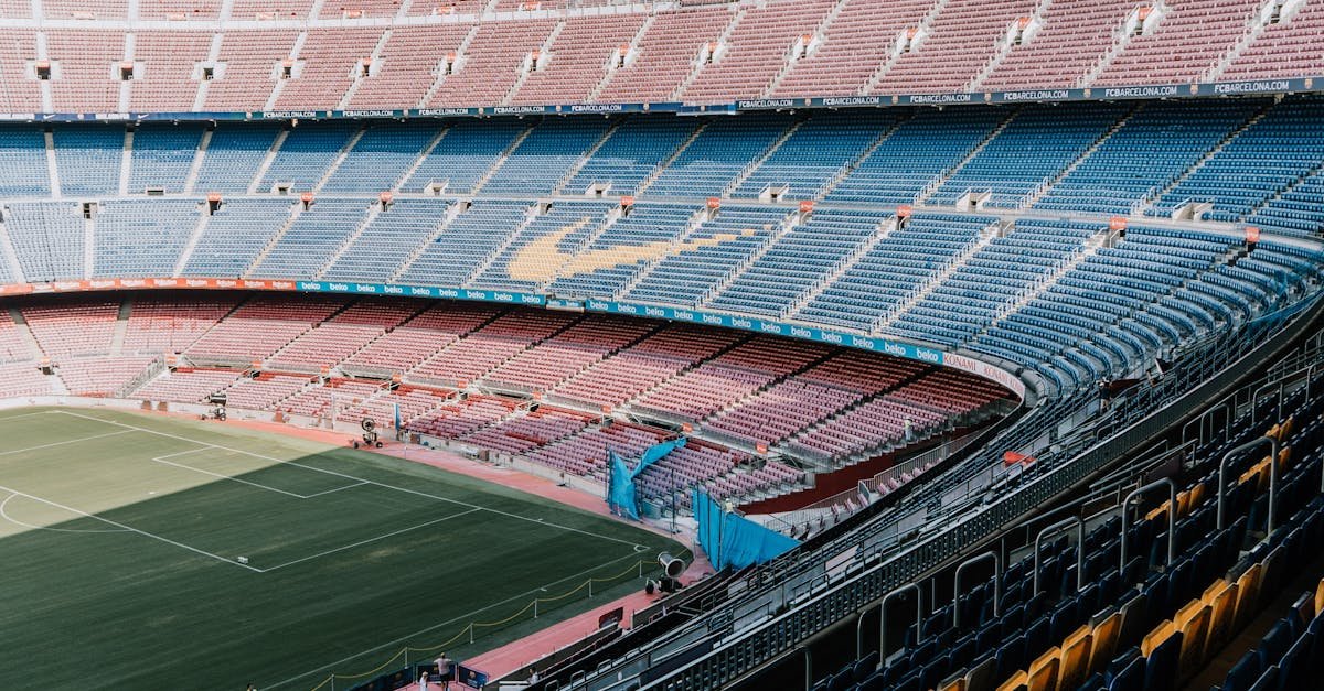 A serene view of Camp Nou Stadium seating, showcasing its vastness and iconic design in Barcelona, Spain.