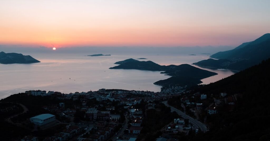 Breathtaking sunrise view over Kaş, Antalya, highlighting the serene coastline and islands.