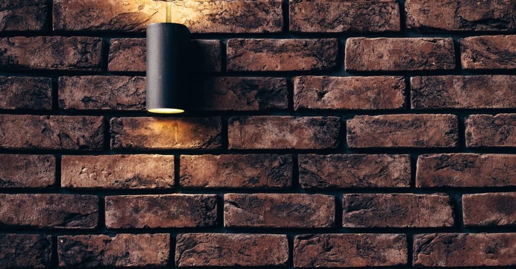 Contemporary brick wall design featuring a sleek accent light.
