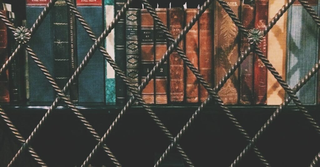 Historic books displayed on a shelf secured with iron bars, ideal for educational and vintage themes.
