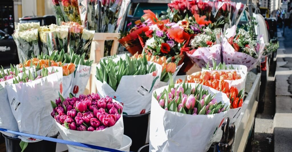 Bustling flower market with vibrant bouquets in Milan's lively streets.