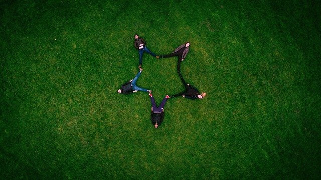 adults, friends, formation, grass, star shape, star formation, lying down, on the grass, nature, grassy, field, meadow, grassland, friendship, together, outdoors, people, recreation, star, team, green grass