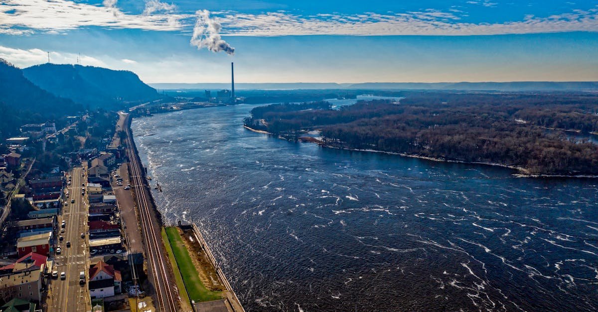 Scenic aerial view of the Mississippi River and surrounding landscape in Alma, Wisconsin, during daylight.