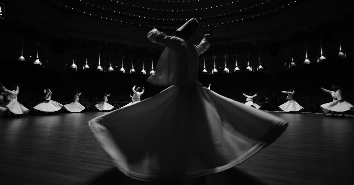 Captivating black and white image of whirling dervishes performing in Konya, Türkiye.