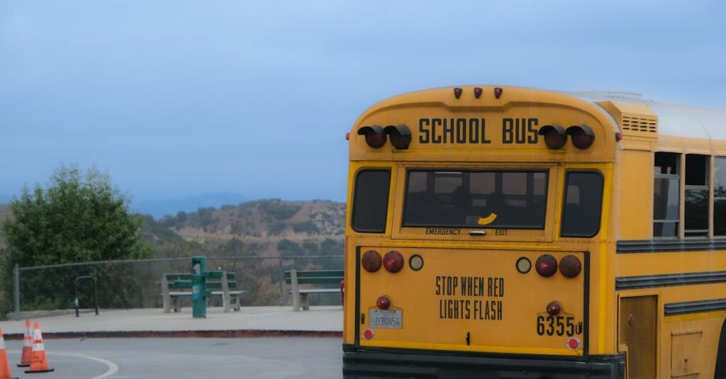 A classic yellow school bus parked in a scenic outdoor area in Los Angeles.