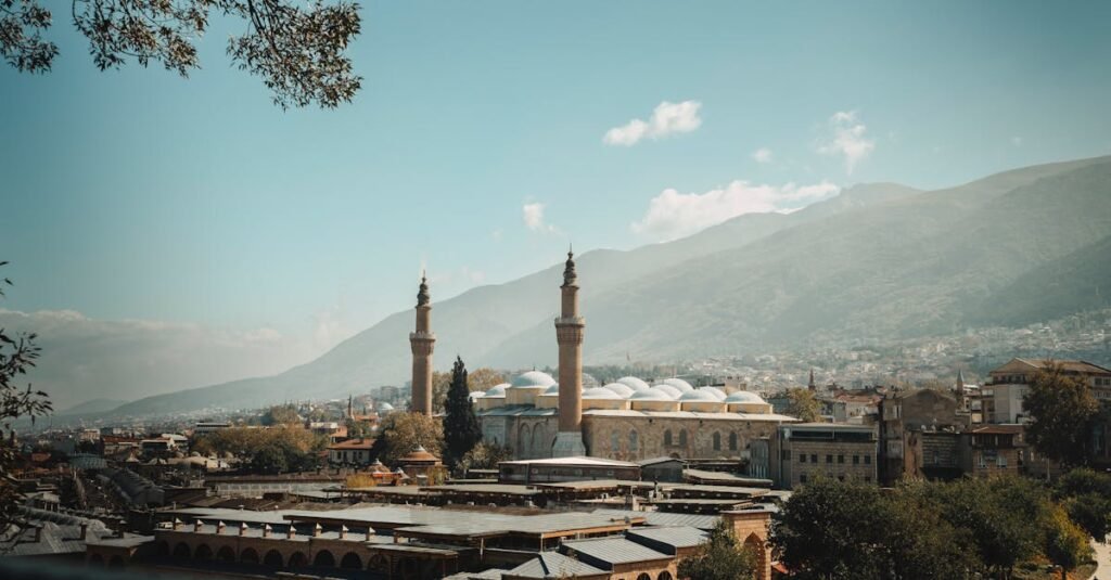 Beautiful view over Bursa, Turkey, with Ulu Mosque and scenic mountain backdrop.