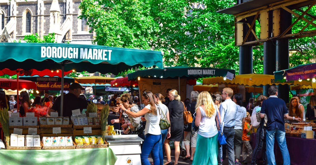 Lively scene at Borough Market in London, filled with people shopping and enjoying the atmosphere.