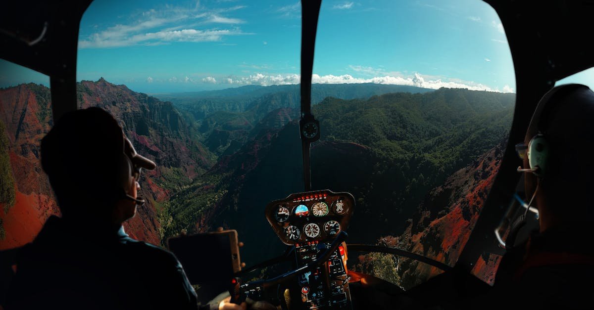 Experience breathtaking aerial views from a helicopter over Kauai's lush valleys and mountains.