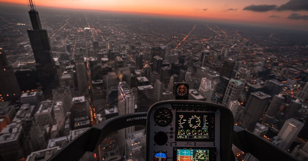 A mesmerizing aerial view of Chicago's skyline at dusk from a helicopter cockpit.
