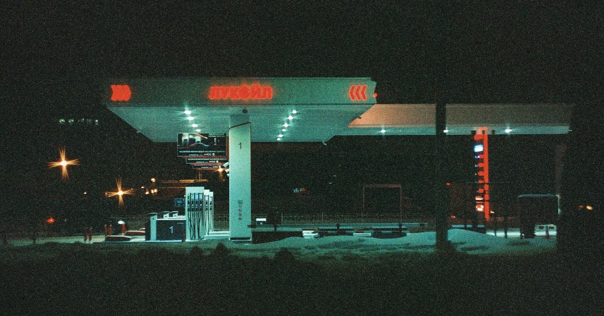 Atmospheric night view of an illuminated gas station in Saint Petersburg, Russia.