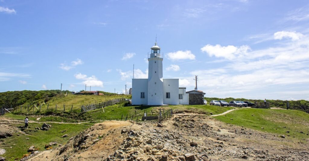 A picturesque view of Inceburun Lighthouse under a clear blue sky in Sinop, Turkey.