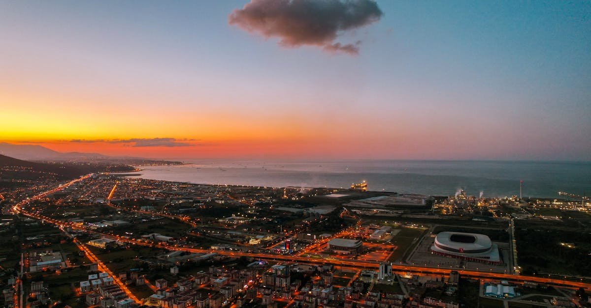 A breathtaking aerial view of Samsun at sunset, showcasing the cityscape and coastline in vivid colors.