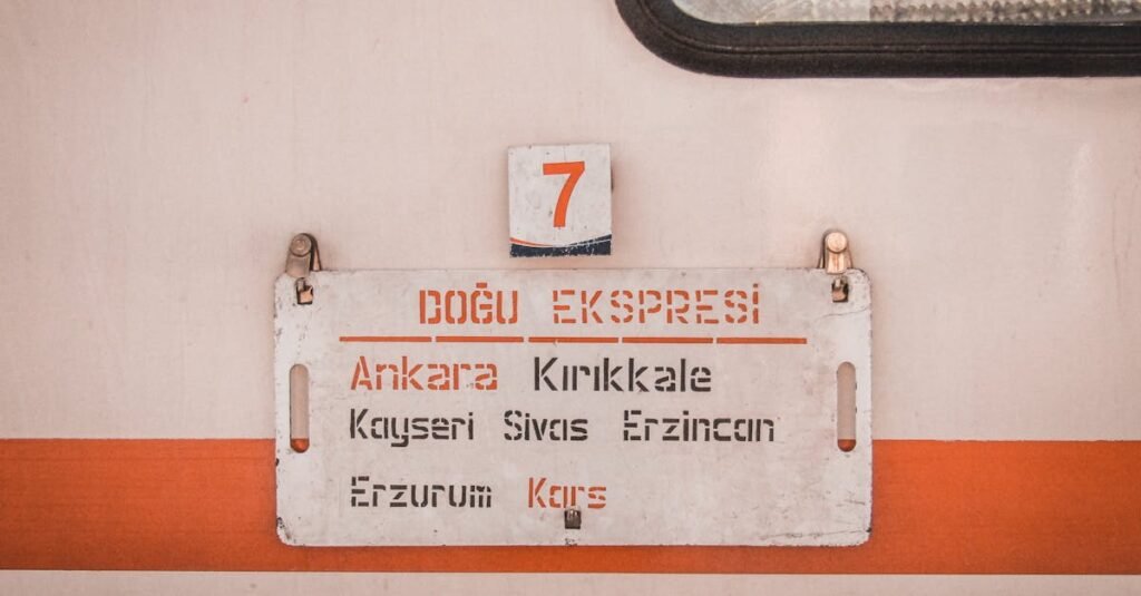 Close-up of a vintage train sign showing routes through Turkey on the Doğu Ekspresi line.