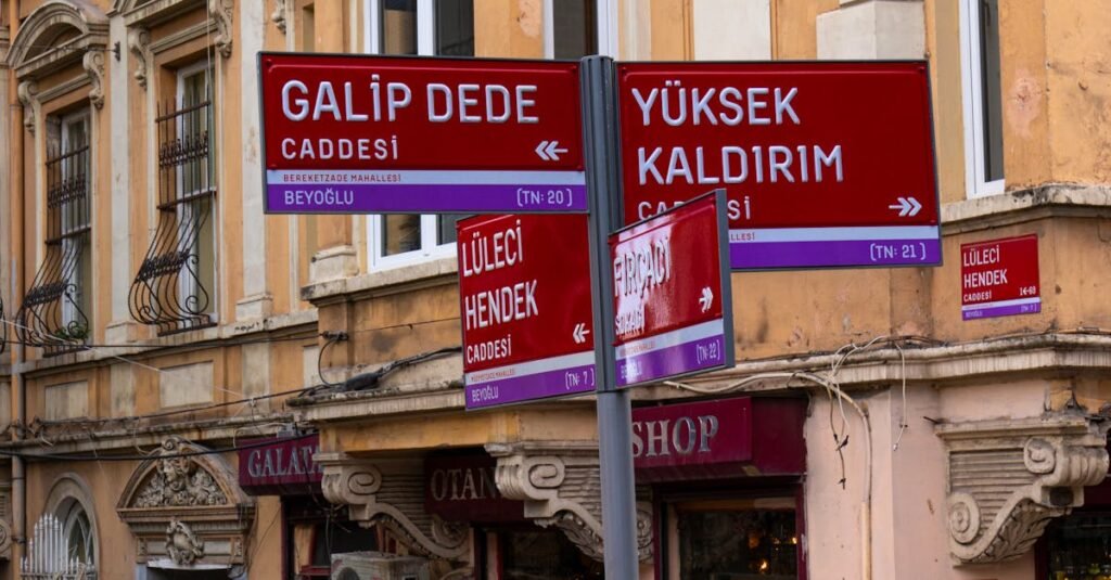 Street corner with Galip Dede Caddesi signs and historic architecture in Beyoğlu, İstanbul.