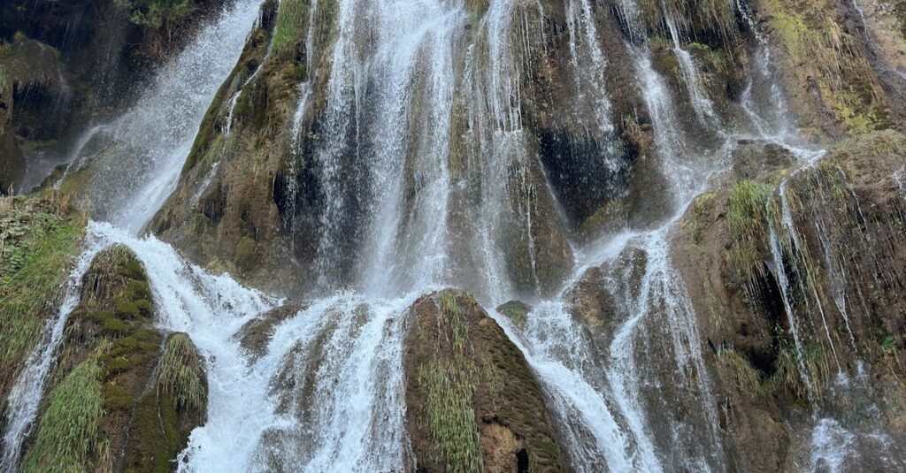 Stunning waterfall cascading down cliffs in Erzincan, Türkiye, during summer.