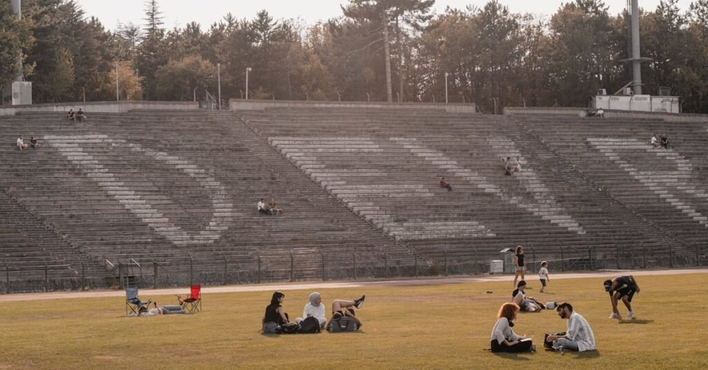 People enjoying leisure time at an outdoor stadium in Ankara, Türkiye.