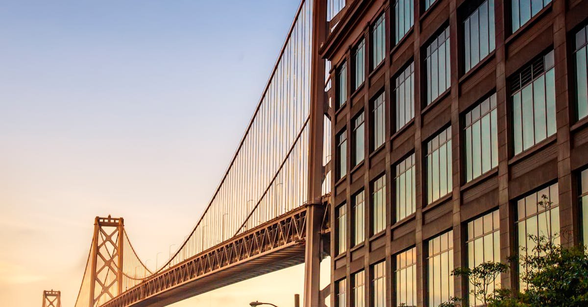Stunning view of the Bay Bridge from downtown San Francisco at sunrise.