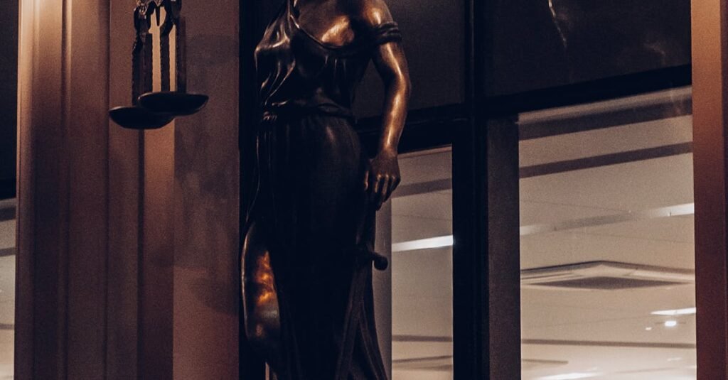 Statue of Lady Justice in a sophisticated interior setting in İstanbul, Turkey.