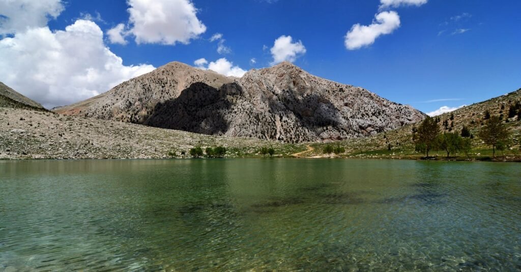 Stunning mountain lake view in Gömbe, Antalya, with clear skies and natural beauty.
