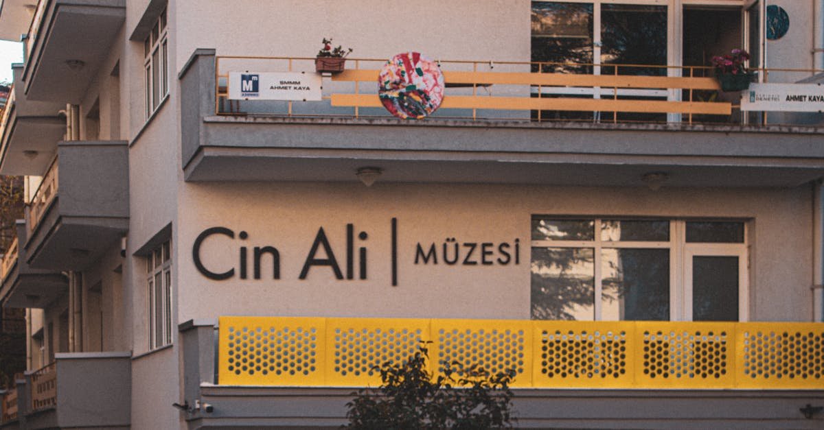 View of Cin Ali Müzesi building facade with balcony and signage in Ankara, Türkiye.