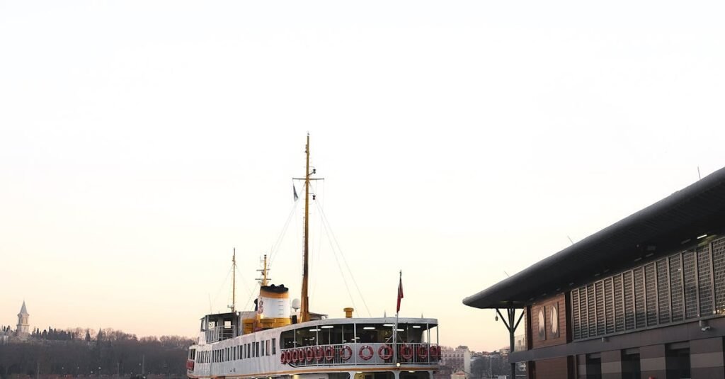 Scenic view of a ferry docked at Avcılar waterfront in Istanbul during sunset, capturing the nautical essence.