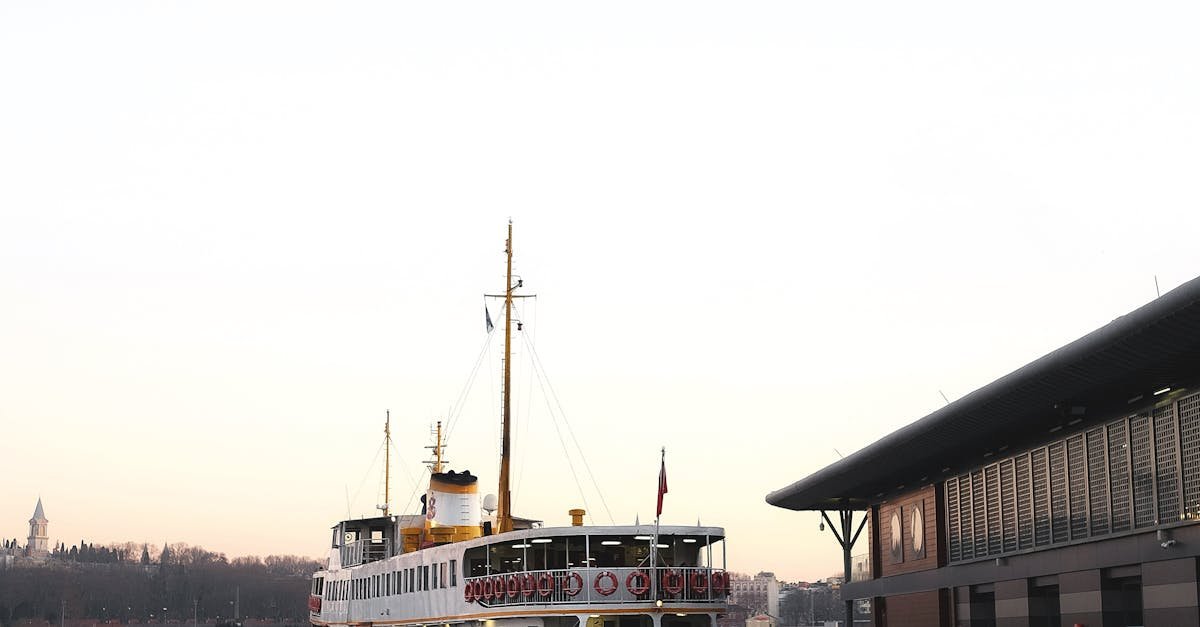 Scenic view of a ferry docked at Avcılar waterfront in Istanbul during sunset, capturing the nautical essence.