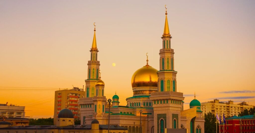 Stunning view of the Moscow Cathedral Mosque during sunset with a golden dome and minarets.