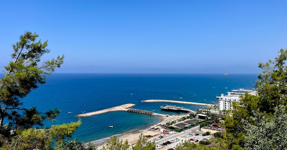 Breathtaking view of the Mediterranean coastline with a clear blue sea and lush greenery.