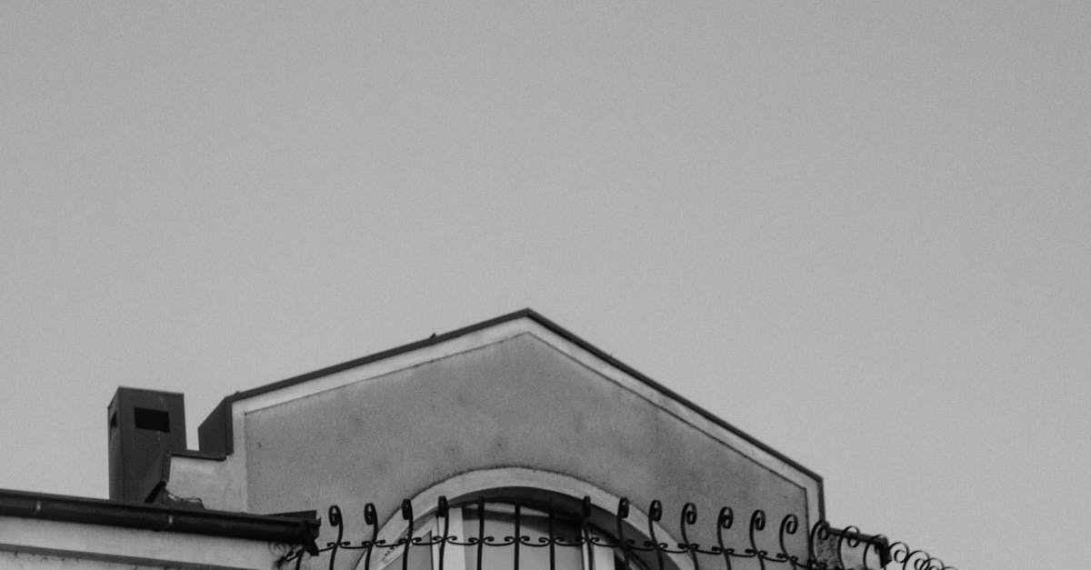 A monochrome view of a classic balcony in Ohrid, North Macedonia.