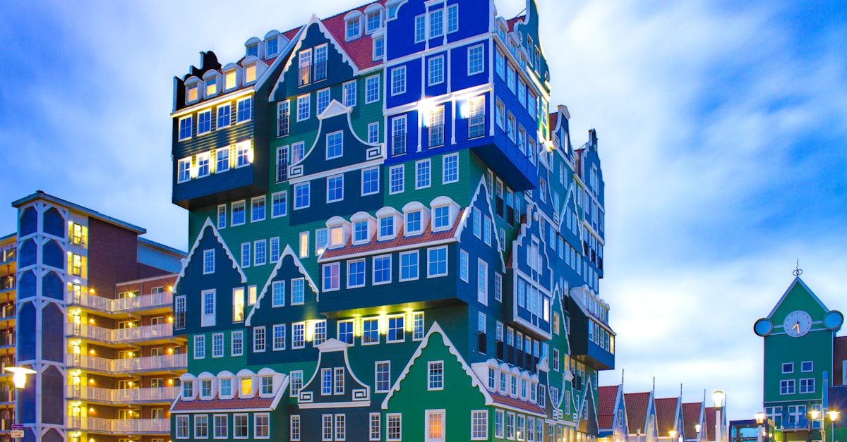 Distinctive stacked building design in Zaandam, Netherlands, during twilight.
