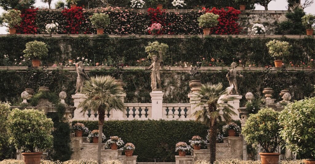 Explore the ornate garden of Palazzo Borromeo on Isola Bella, a serene oasis on Lake Maggiore.
