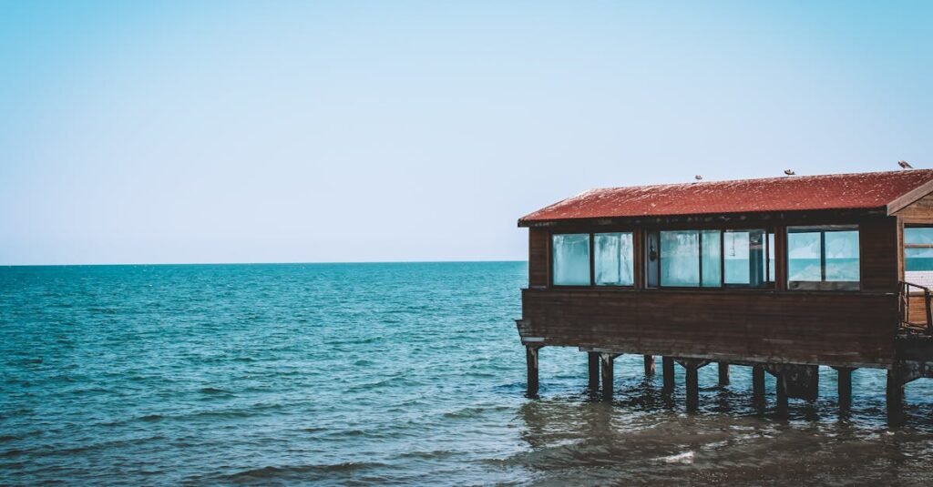 Scenic view of a wooden dock over calm ocean waters under a clear blue sky in Ordu, Türkiye.