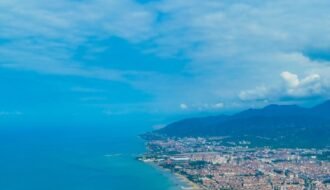 Breathtaking aerial view of Boztepe in Ordu, Türkiye with city skyline and ocean.