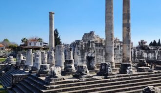 Explore the majestic ruins of the Temple of Apollo in Didim, showcasing ancient history amidst stunning architecture.