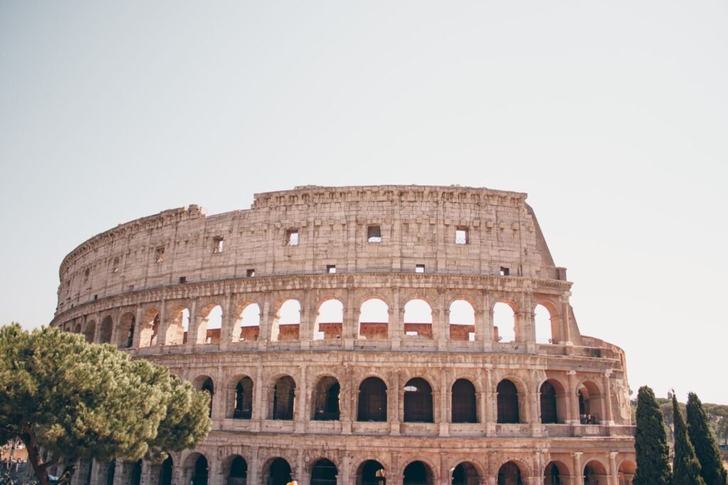 Stunning view of the Colosseum in Rome, showcasing its ancient architecture and historical significance.