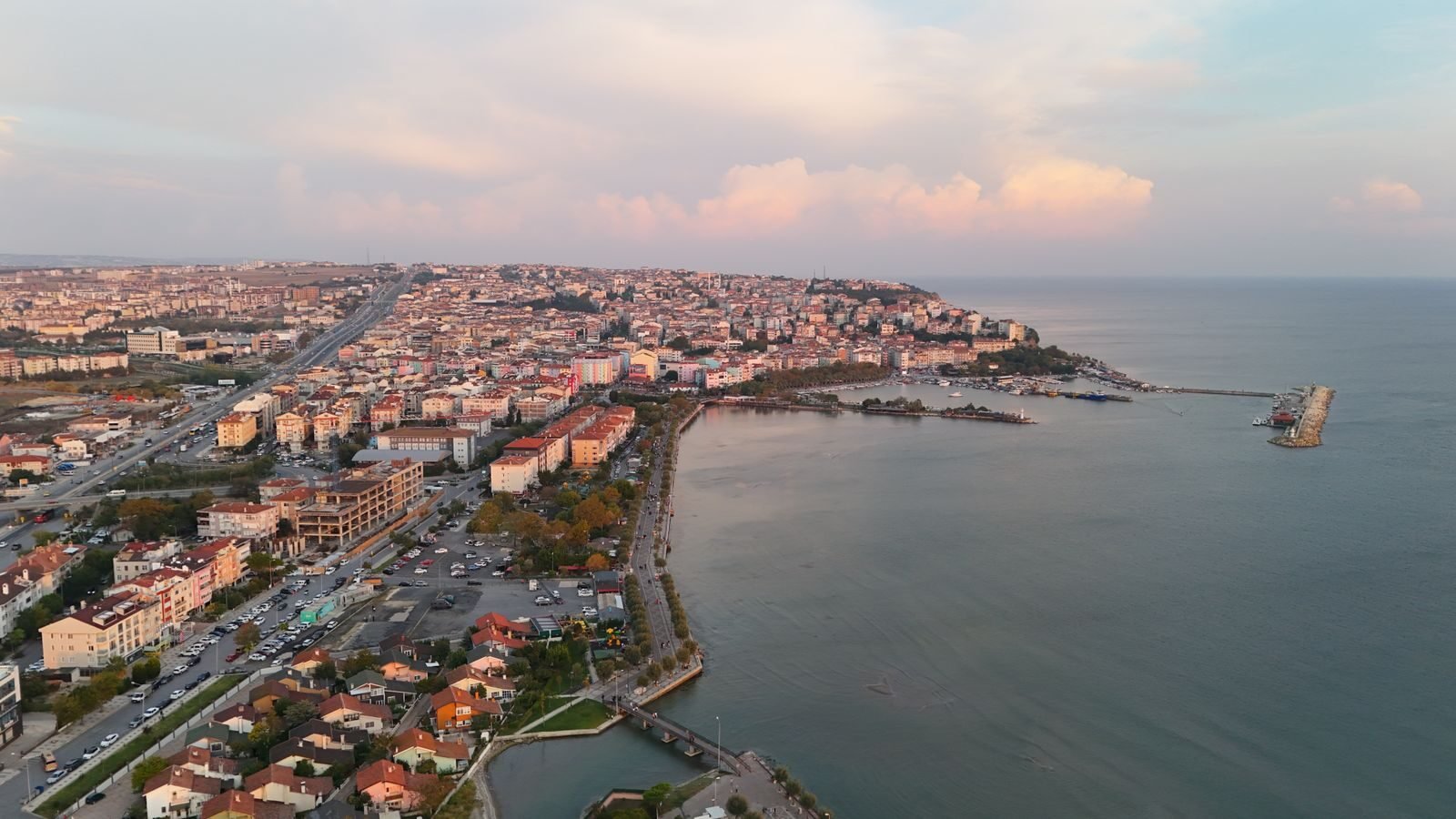 Captivating aerial view of Silivri, İstanbul during sunrise showcasing the coast and urban landscape.