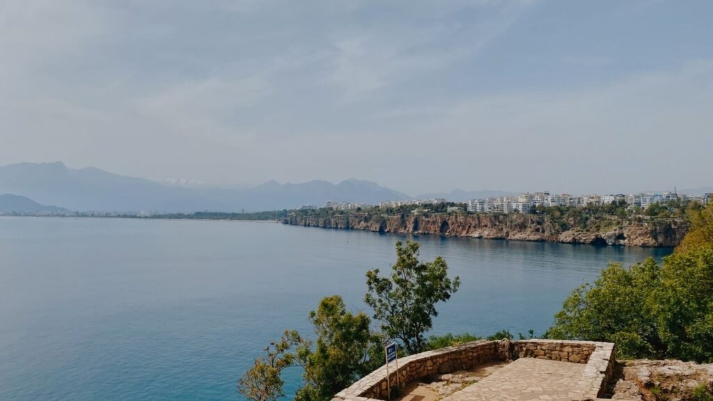Beautiful coastal cityscape along the cliffs of the Mediterranean on a clear day.