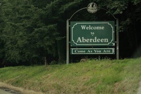 a sign on the side of a road