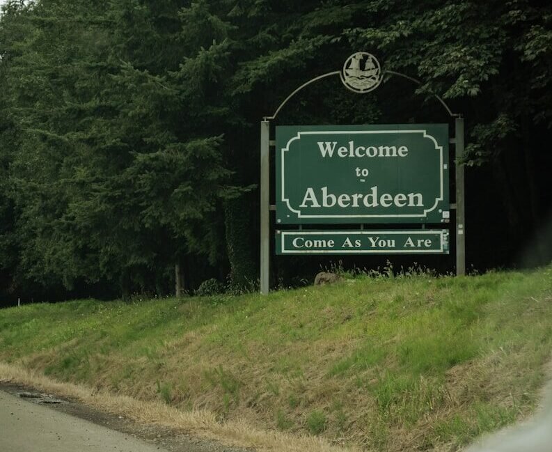 a sign on the side of a road