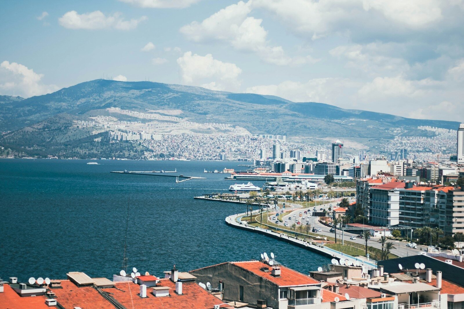 A large body of water with a city in the background