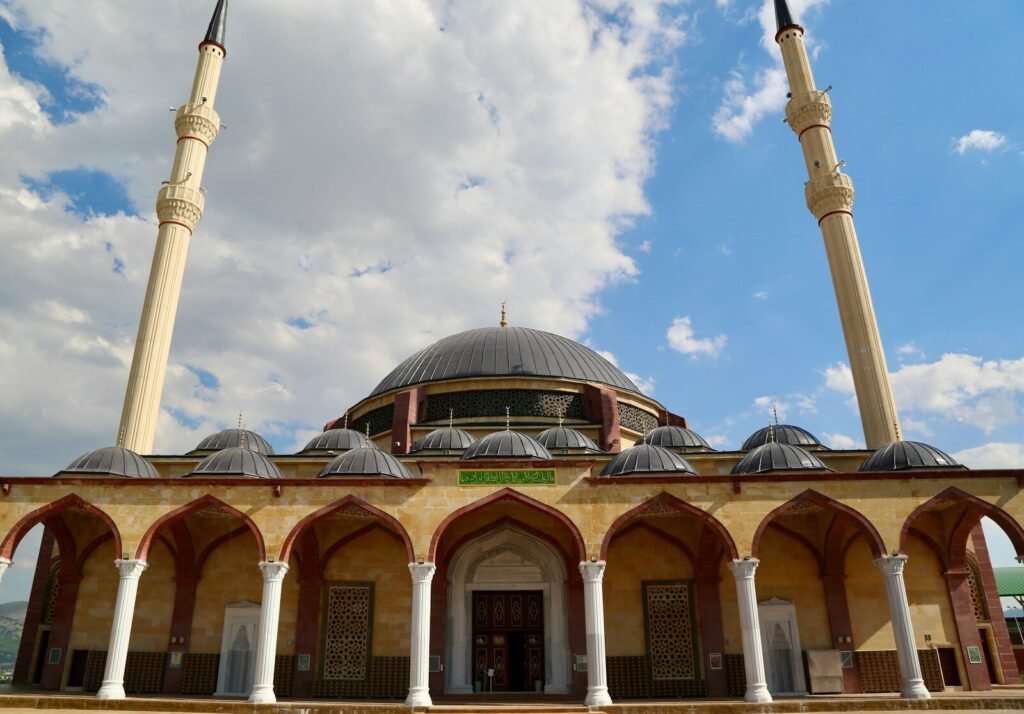a building with a dome roof and towers