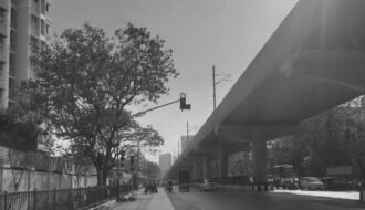 a black and white photo of a city street