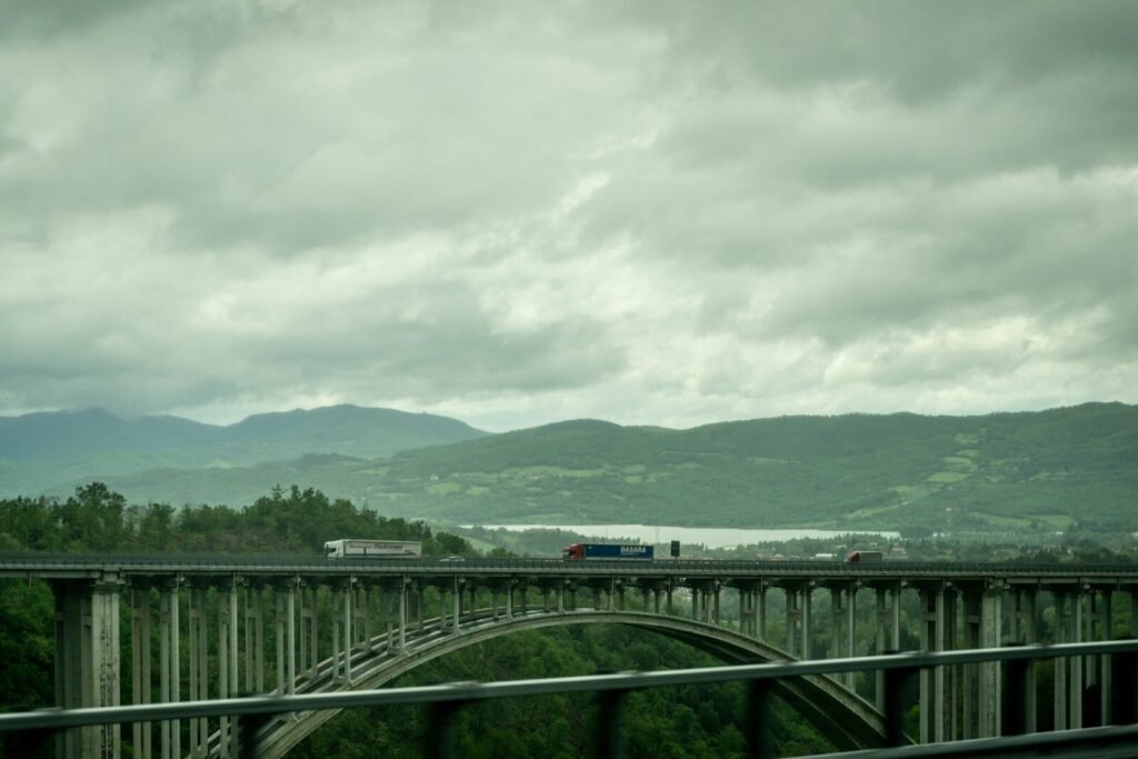 a train crossing a bridge over a river