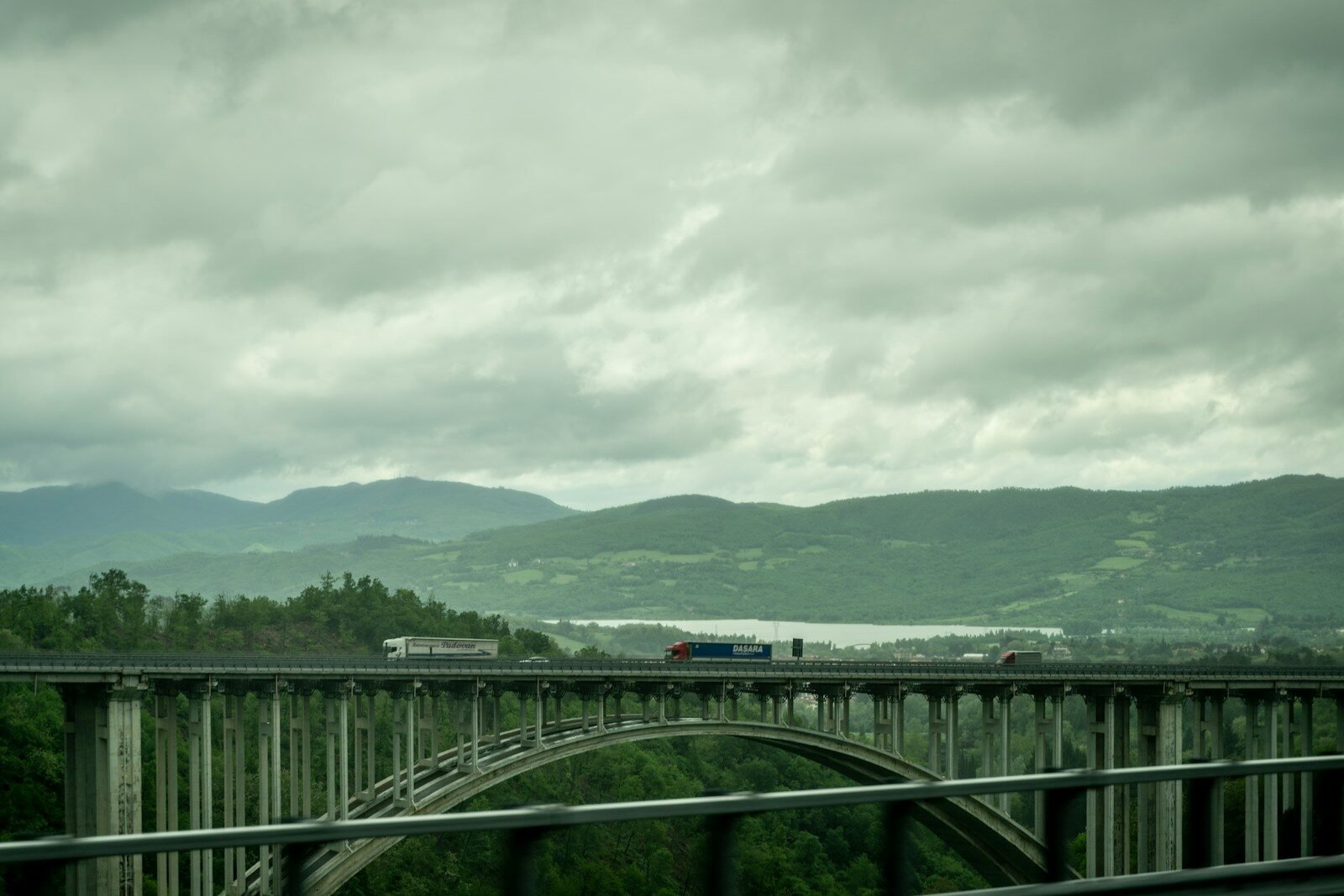 a train crossing a bridge over a river