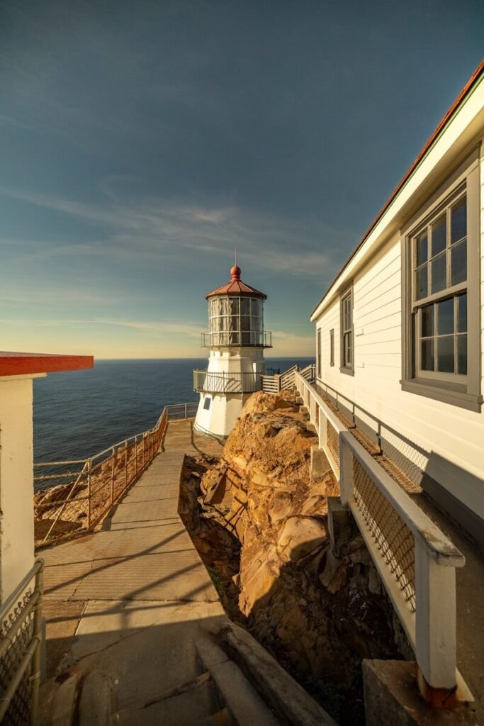 Lighthouse on a rocky cliff overlooking the ocean
