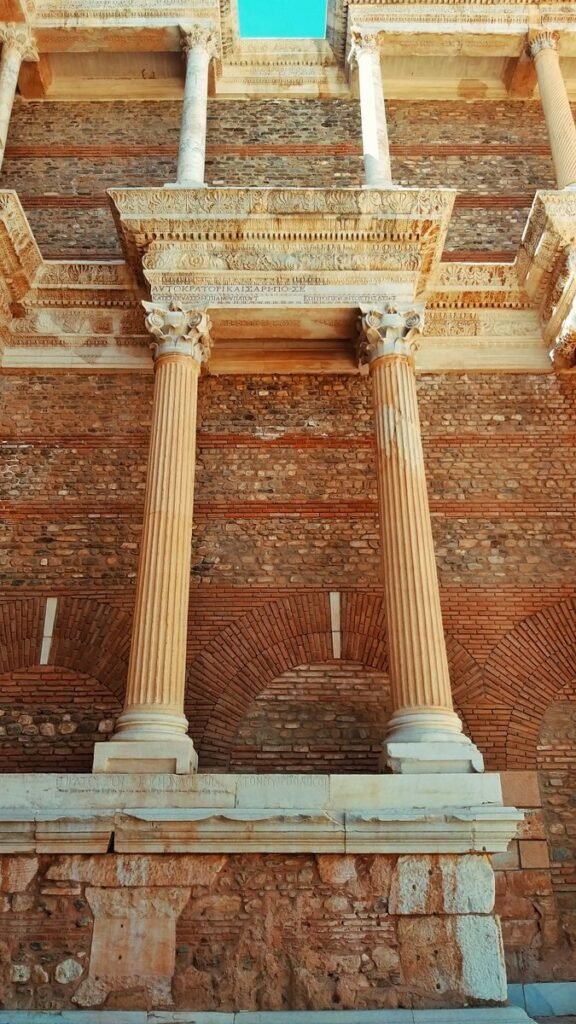 View of ancient Roman columns and architecture in Manisa, Türkiye, showcasing historical grandeur.