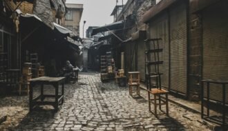 a cobblestone street in an old city